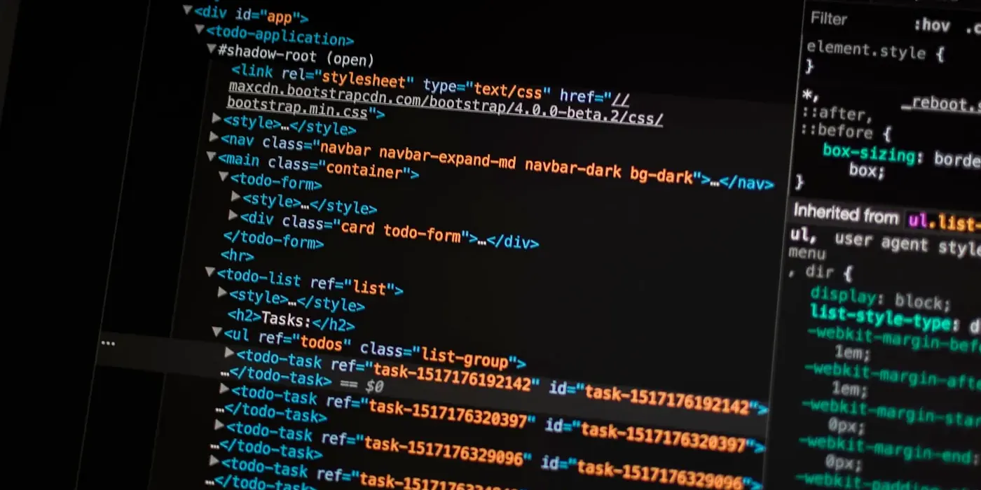 Engineers reviewing software on multiple screens