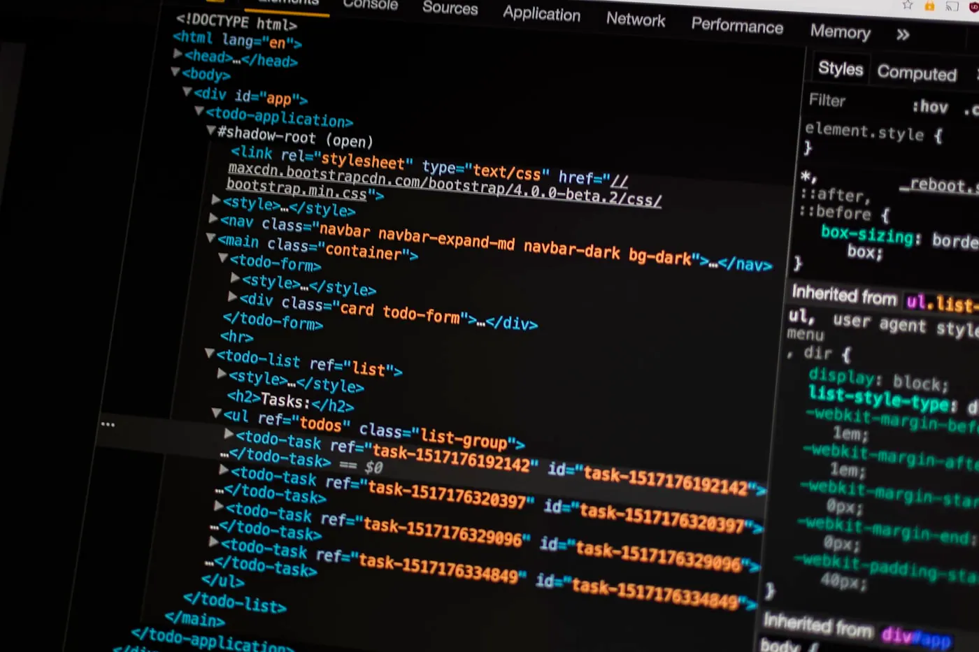 Engineers reviewing software on multiple screens