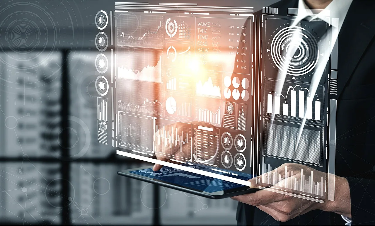 Business user holding a tablet with data and analytics panels representing an AI-powered business app Business user holding a tablet with data and analytics panels representing an AI-powered business app